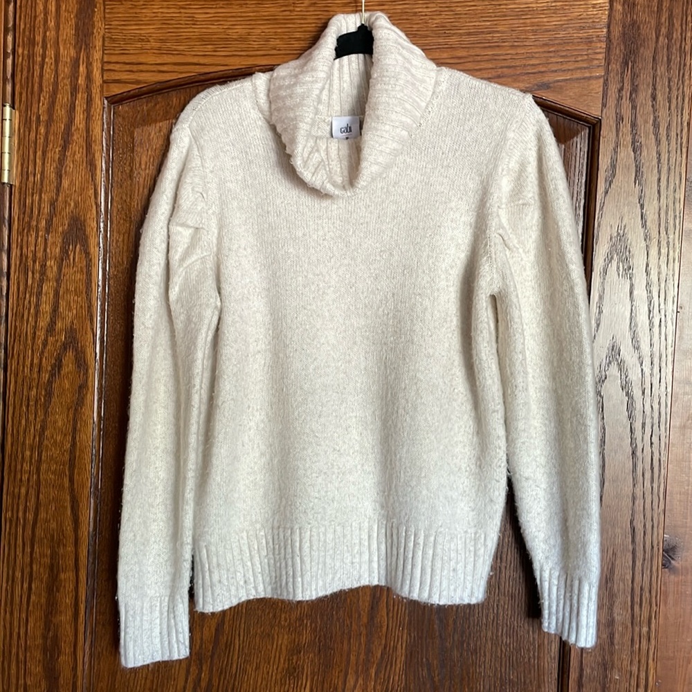 Cabi cream colored Medium sized turtleneck sweater